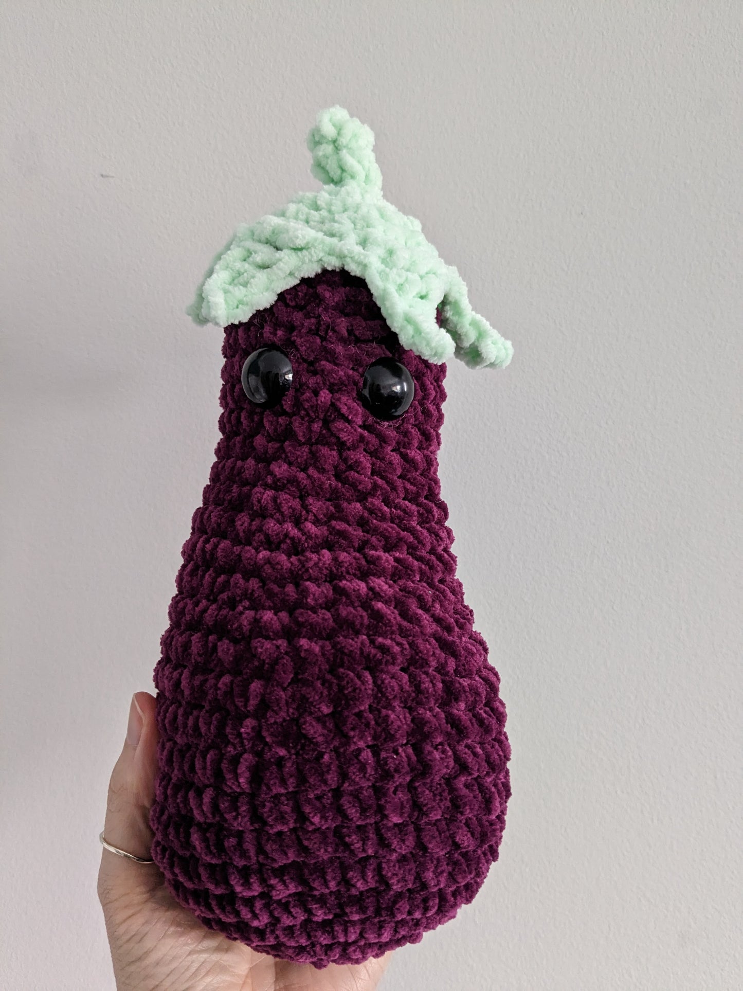 Aubergine Emoji crochet item