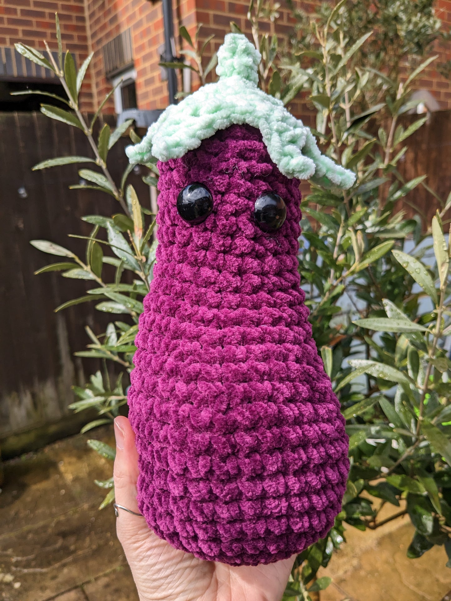 Aubergine Emoji crochet item