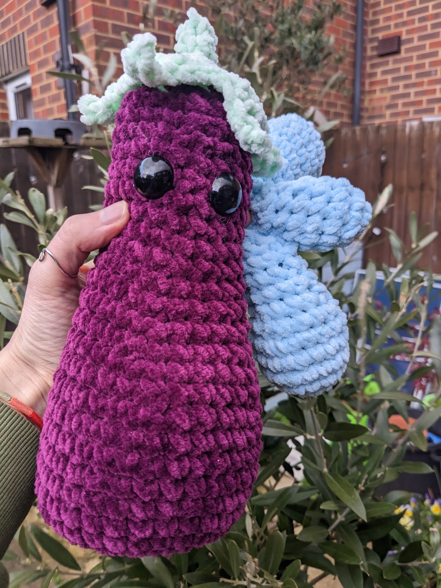 Aubergine Emoji crochet item