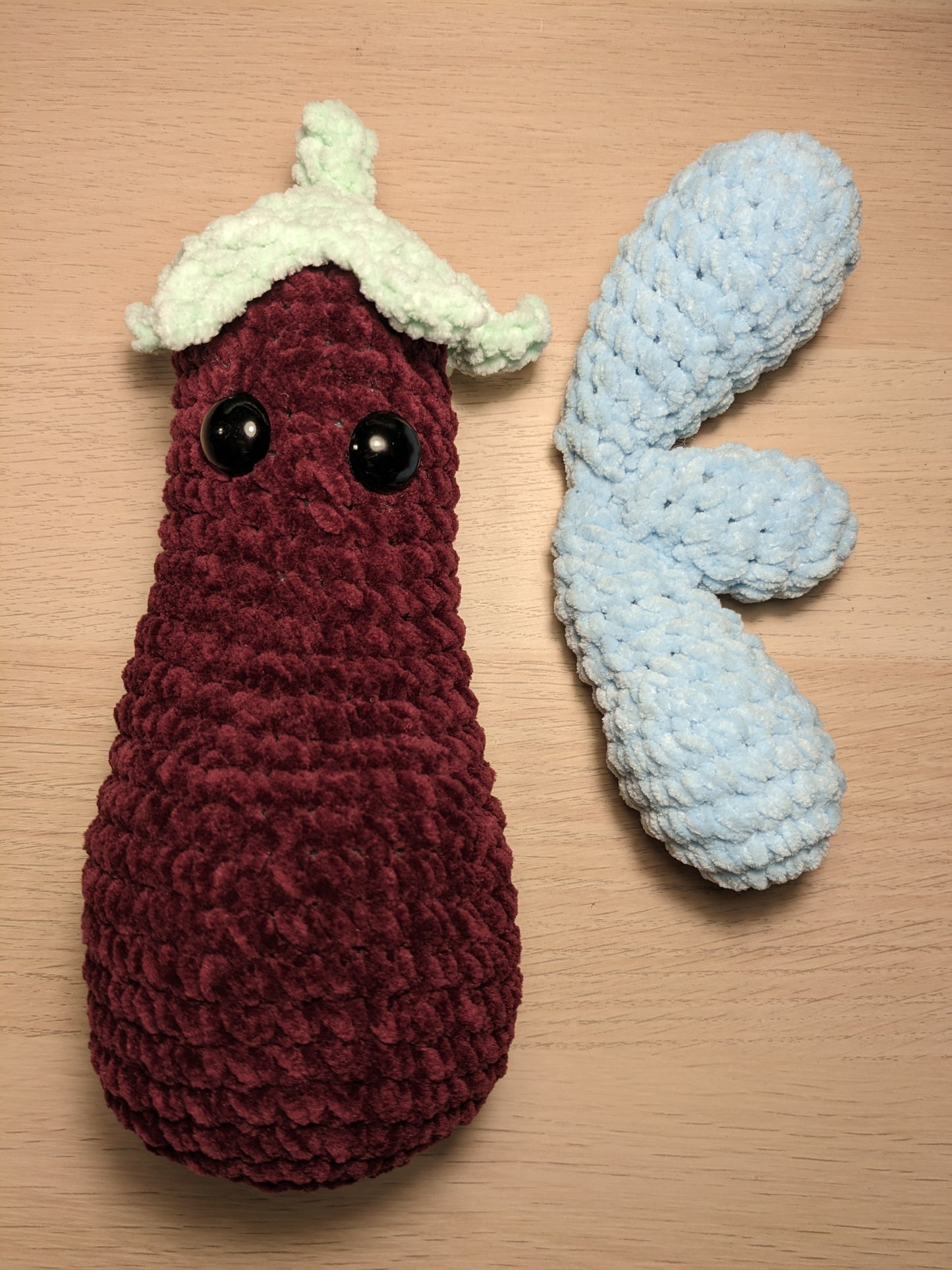 Aubergine Emoji crochet item